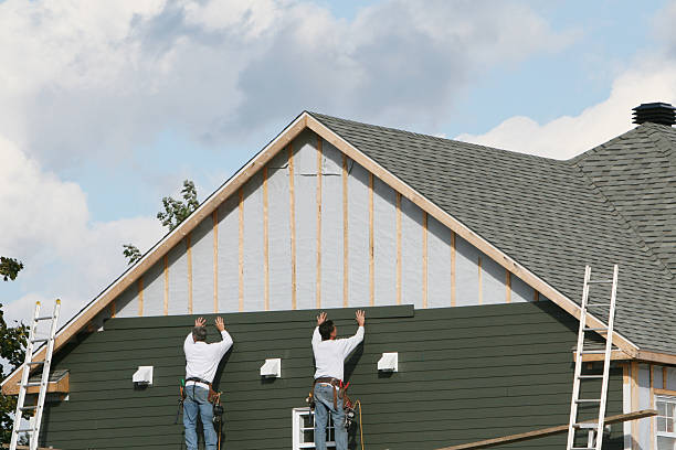 Professional Storm Damage Siding Repair technician working in Evanston, IL